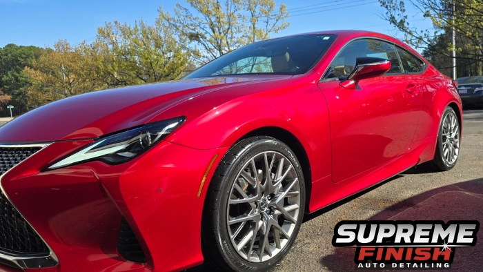 2022 Lexus RC 350 F Sport after paint correction and ceramic coating in Raleigh NC showing deep red gloss and sharp reflections